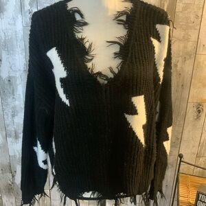Polly & Esther Black and White V-Neck Sweater with Lightening bolts.